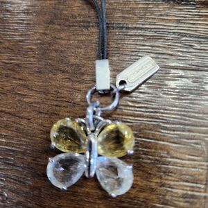 Elegant Coach Butterfly Phone Charm